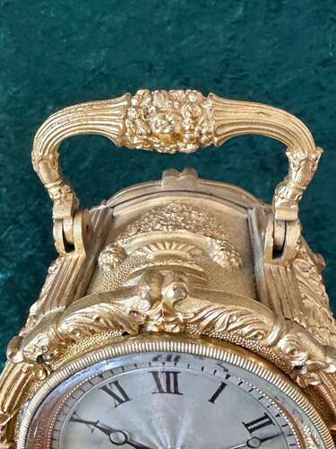 Carriage Clock In A Cast Gilt Case