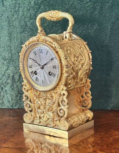 Carriage Clock In A Cast Gilt Case