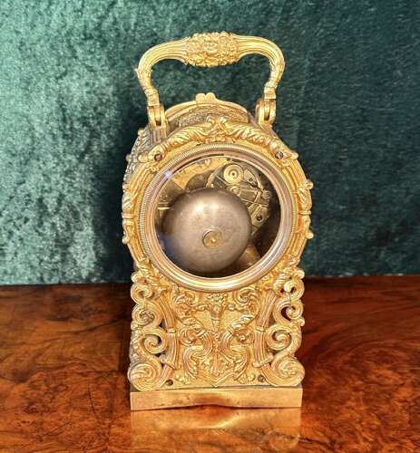 Carriage Clock In A Cast Gilt Case