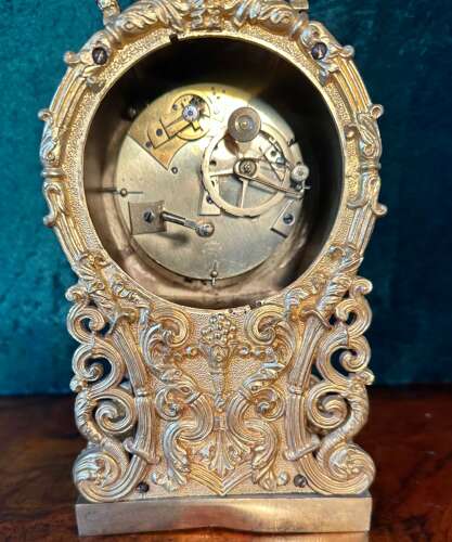 Carriage Clock In A Cast Gilt Case