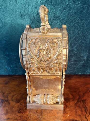 Carriage Clock In A Cast Gilt Case