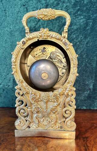 Carriage Clock In A Cast Gilt Case