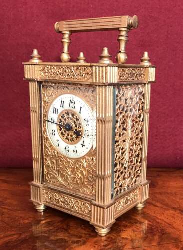 Carriage Clock With Filigree Mask And Side Panels Circa 1900