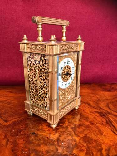Carriage Clock With Filigree Mask And Side Panels Circa 1900