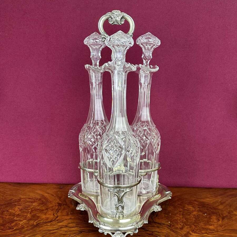 Decanters Contained In An Ornate Frame It Circa 1875
