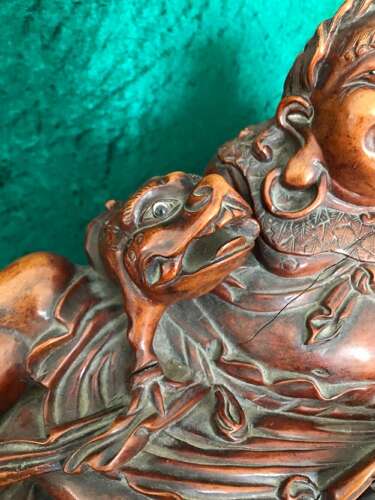 An Amusing Reclining Figure Of A Corpulent Buddha. Chinese. Sculpture. Circa 1900